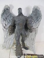 Front view of 12-inch Redemption Spawn with wings displayed