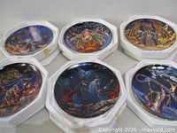 All six plates in foam cases view 1