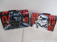 Front view showing both lunch boxes and graphics