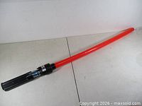 Full view of 1980 Kenner red-blade light saber toy