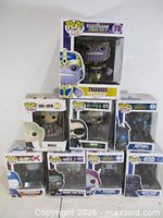 Front view of eight boxed Funko Pop figures stacked