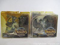 Front view of both sealed McFarlane’s Dragons figures