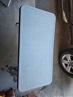 Top view of gray rectangular folding table