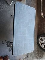 Top view of gray plastic folding table