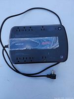 Top view of APC Back-UPS 650 showing outlet layout and power cord