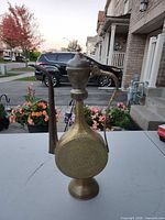 Full view of brass ewer front profile