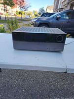 Front angled view showing display panel, volume knob, power button and general condition
