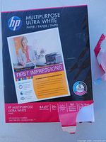 Front of HP Multipurpose Ultra White paper ream showing branding, size, weight, sheet count