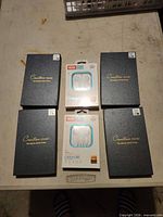 Group shot showing all phone cases and earphones