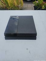 Top and front view of Sony PS4 console