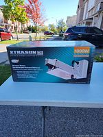 Front of retail box showing XTRASUN DE 1000W double-ended enclosed system