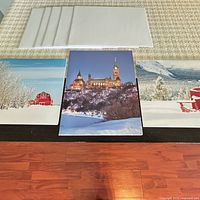 Five white envelopes and three winter scene greeting cards displayed on tabletop