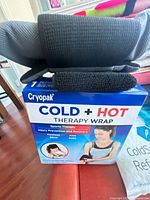 Cryopak therapy wrap box with fabric wrap on top