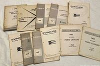 Group shot of roughly 13 catalogs showing Johnson and Evinrude covers, various years