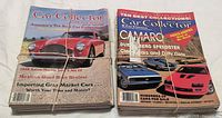 Two bundled stacks of Car Collector & Car Classics magazines