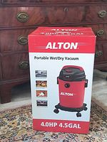 Front of sealed box showing Alton portable wet/dry vacuum, 4.0 HP 4.5 GAL