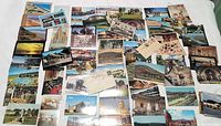 Overhead view of entire assortment of postcards spread out