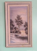 Full view of framed winter landscape painting