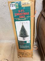 Front of cardboard box showing product name and height