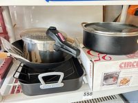 Group shot showing all cookware pieces on shelf