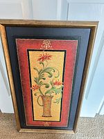 Front view of framed floral wall art