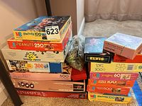 Stacked view of majority of puzzle boxes