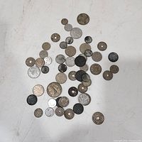 Full spread of all coins on tabletop