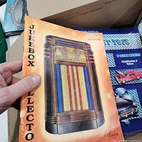 Jukebox Collector catalog and Diecast Toys catalog visible