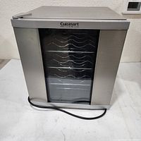 Front view of Cuisinart stainless steel wine cooler with glass door and power cord
