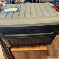 Closed Rubbermaid ActionPacker bin showing exterior and brand
