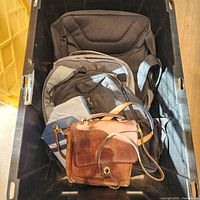 Overview of all bags inside plastic bin