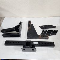 All six hitch components laid out