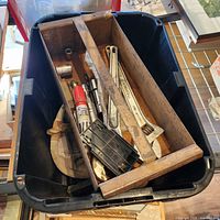 overview of tote with metal tray and hand tools