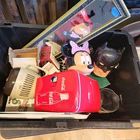 Overview of tote showing mini Coke fridge, percolator, Disney and Batman heads