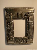 Front view showing ornate dragon relief and torii gate styling