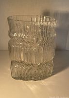 Front view showing full vase form and ice-textured surface