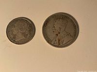 Obverses of both coins showing portraits