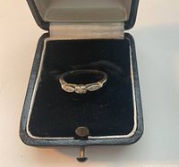 Ring in open presentation box showing overall design