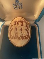 Cameo inside Birks box showing frontal carving