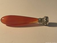 Side view showing entire wax seal handle and silver ferrule