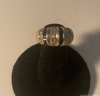 Front view of 14K gold band showing alternating diamond and sapphire rows