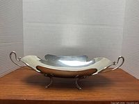 Side view of Italian 800 silver bowl showing handles and feet