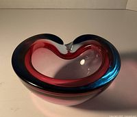 Top view showing blue outer layer, pink inner layer, freeform rim