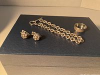 Earrings, bracelet, ring overview