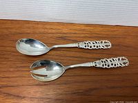 Salad serving spoon and fork, full view