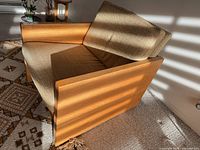 Front angled view showing full chair, frame, upholstery