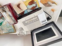 Sony clock radio, digital photo frame, carved fish piece, cables