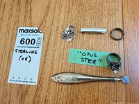 All five sterling items with MaxSold tag