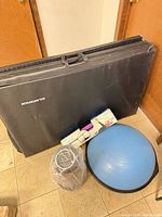 All items: mat, balance trainer, pilates kit box, roller, bands