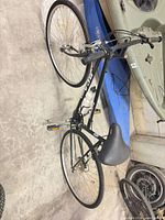 Full side view of black BCA USA Parkwood bicycle showing overall condition and components